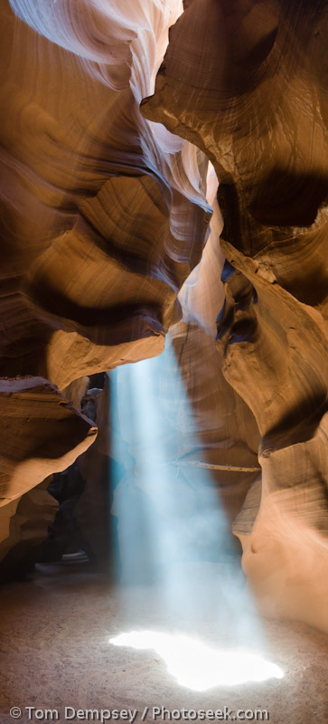 A ray of sunlight pierces Upper Antelope Canyon, near Page, Arizona, USA. Antelope Canyon Navaho Tribal Park. (I stitched this picture from three overlapping images.)